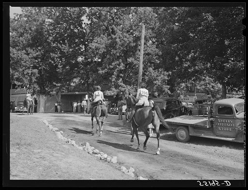 Entries in the best horsemanship class going into the ring at the Shelby County horse show and fair. Shelbyville, Kentucky