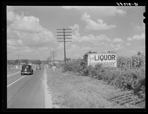 Signs advertising liquor stores are seen frequently along all Kentucky highways. South of Bardstown