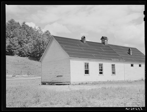 Untitled photo, possibly related to: Two-room school house near Morehead, Kentucky. In these mountain areas the school term begins in June and goes through January, because in the late winter and spring months the weather is so severe and roads so bad and children's' clothing is too inadequate