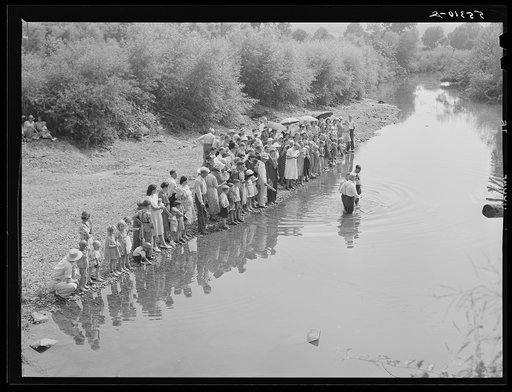 Members of the Primitive Baptist Church in Morehead, Kentucky, attending a creek baptizing by submersion