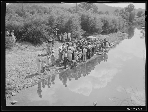 Members of the Primitive Baptist Church in Morehead, Kentucky, attending a creek baptizing by submersion