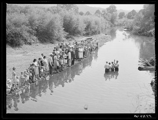 Members of the Primitive Baptist Church in Morehead, Kentucky, attending a creek baptizing by submersion