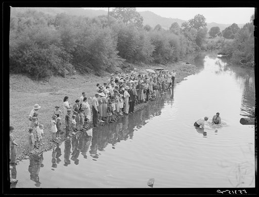 Members of the Primitive Baptist Church in Morehead, Kentucky, attending a creek baptizing by submersion