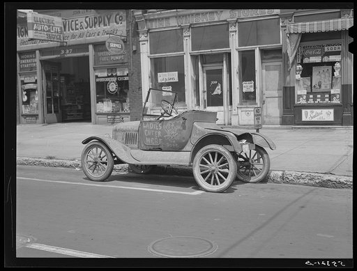 Untitled photo, possibly related to: Car belonging to "Hep Cats" on main street in Louisville, Kentucky