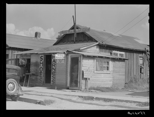 Shoe and harness repair shop and beauty shop. Shelby, Mississippi