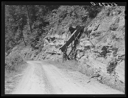 Mountain families in Kentucky "raise" their own coal in the back yard along roadsides. Up Morris Fork of Kentucky River