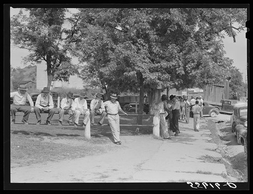Mountain people and farmers exchanging news and greetings near the courthouse on court day. Campton, Wolfe County, Kentucky