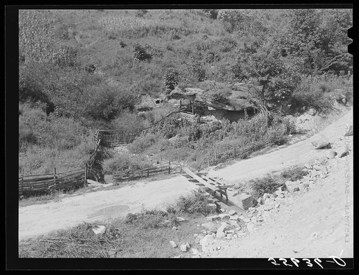Ledge of rock fenced in and used as shelter for stock by mountain family.  Near Jackson, Kentucky
