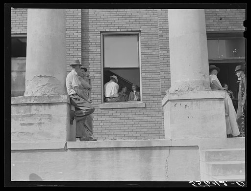 Farmers and townspeople in front of courthouse on court day in Campton, Kentucky