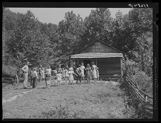 One-room schoolhouse showing overcrowded conditions and need for repairs and equipment. Breathitt County, Kentucky