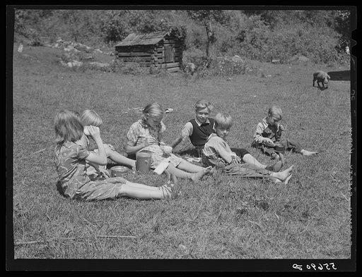 In Breathitt County, Kentucky, the children must travel such long distances over poor roads and up creek beds that they bring their lunches in pails. Mrs. Marie R. Turner, the county superintendent is trying to institute a hot lunch program in all the schools to give them a more well-balanced diet a