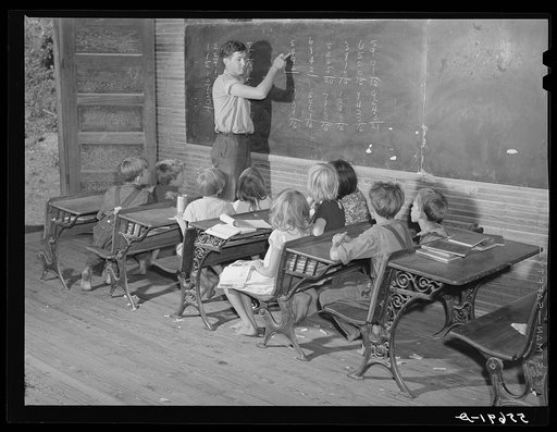 One-room schoolhouse showing overcrowded conditions and need for repairs and equipment. Breathitt County, Kentucky
