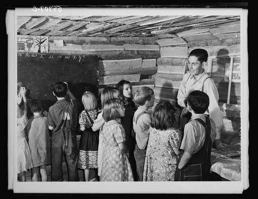 One-room schoolhouse showing overcrowded conditions and need for repairs and equipment. Breathitt County, Kentucky