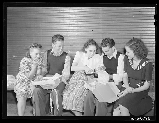 Many parents and young people from the school and nearby communities attend the pie and box supper, given by the school to raise money for additional repairs and supplies. Each box or pie is auctioned off to the highest bidder, sometimes bringing a good deal, since the girl's "boyfriend" usually win