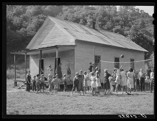 One-room schoolhouse showing overcrowded conditions and need for repairs and equipment. Breathitt County, Kentucky