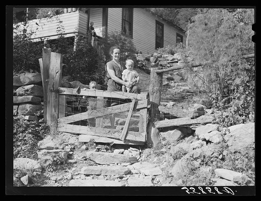 Mountain family in yard up Stinking Creek on Pine Mountain, Kentucky
