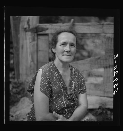 Mountain woman by her home up Stinking Creek, Pine Mountain, Kentucky