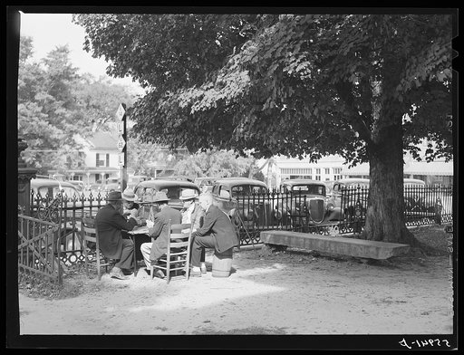 Untitled photo, possibly related to: Men playing cards in yard in front of court house in Yanceyville, Caswell County, North Carolina