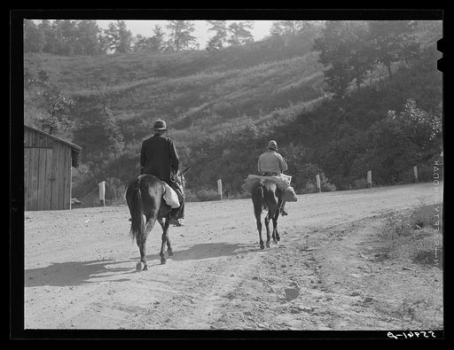 Mountain people bring garden produce to town to peddle and trade for other necessities. Jackson, Breathitt County, Kentucky