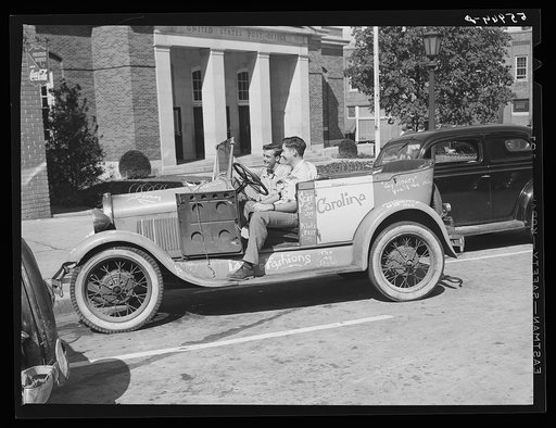 University of North Carolina boys in their car in front of the post office. Chapel Hill, North Carolina