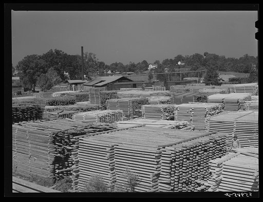 Stacks of lumber and sawmill. Pittsboro, Chatham County, North Carolina