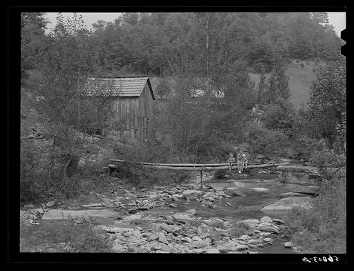 Untitled photo, possibly related to: Farmhouses along creek bed in recently flooded area northwest of Asheville, North Carolina