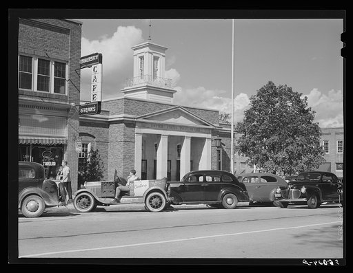 University of North Carolina boys in their car in front of the post office. Chapel Hill, North Carolina