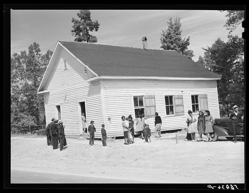 Untitled photo, possibly related to: A minister and deacons meeting in colored church. Caswell County, North Carolina