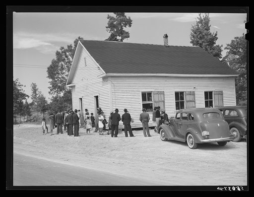Untitled photo, possibly related to: A minister and deacons meeting in colored church. Caswell County, North Carolina