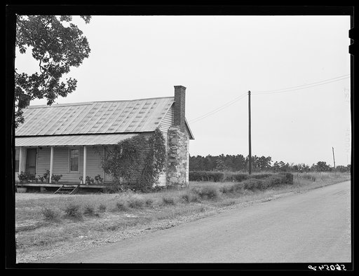 Untitled photo, possibly related to: REA (Rural Electrification Administration) line going to a home in Caswell County, North Carolina