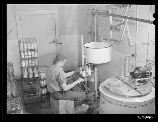 Untitled photo, possibly related to: Pasteurizing and bottling milk in the Caswell Dairy, owned and operated by E.O. Foster, FSA (Farm Security Administration) borrower in Caswell County, North Carolina