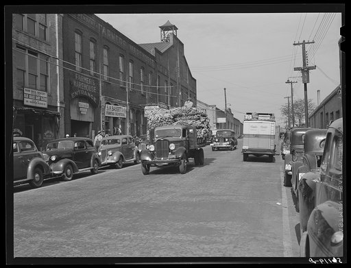 Transporting tobacco from warehouse after auction sale to the cigarette factories and storage warehouse. Danville, Virginia