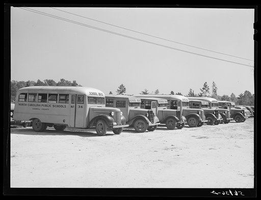 Line of school buses in back of Anderson consolidated school. Caswell County, North Carolina