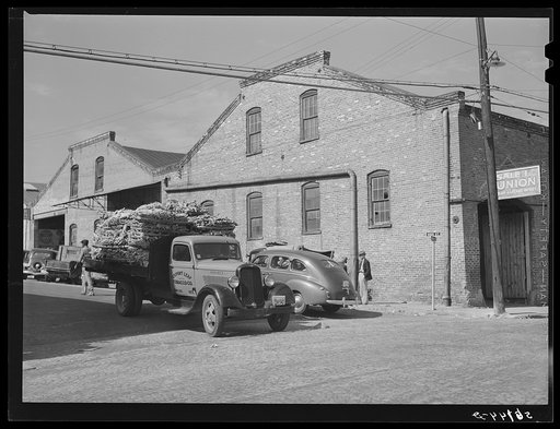 Untitled photo, possibly related to: Transporting tobacco from warehouse after auction sale to the cigarette factories and storage warehouse. Danville, Virginia