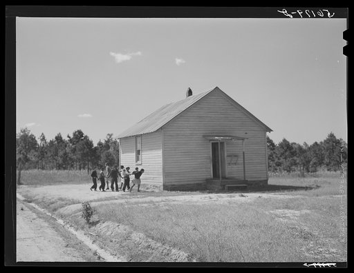 Untitled photo, possibly related to: Williamson School, one-room school in Blanch, Caswell County, North Carolina. There were twenty children enrolled, only eight present, busy tobacco season