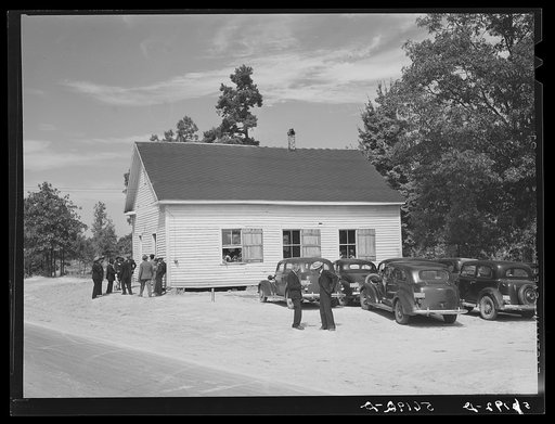 Untitled photo, possibly related to: A ministers and deacons meeting in colored church. Caswell County, North Carolina