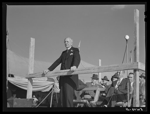 Untitled photo, possibly related to: Listening to the county school superintendent and Governor Hoey speak at the Caswell County fair. Yanceyville, North Carolina