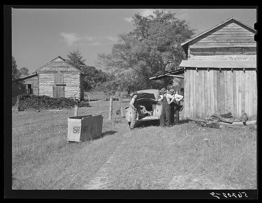 During the tobacco marketing season peddlers drive around to the tobacco barns and strip houses through the county to sell their wares to the farmers and tenants. Caswell County, North Carolina