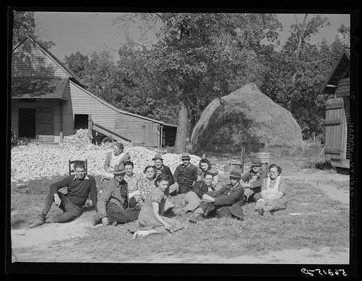 Untitled photo, possibly related to: Resting after dinner following a corn shucking on Hoopers' farm in Corbett Ridge section. Caswell County, North Carolina