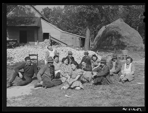 Resting after dinner following a corn shucking on Hoopers' farm in Corbett Ridge section. Caswell County, North Carolina
