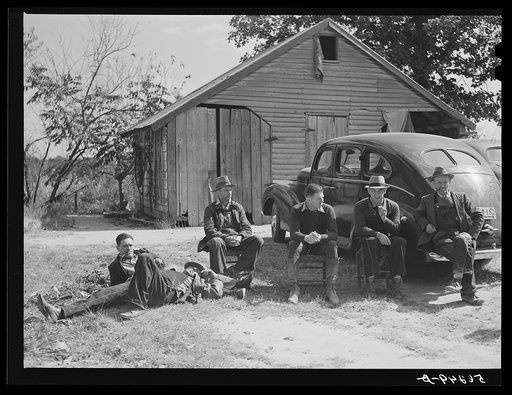 Untitled photo, possibly related to: Resting after dinner following a corn shucking on Hooper Farm in Corbett Ridge section. Caswell County, North Carolina