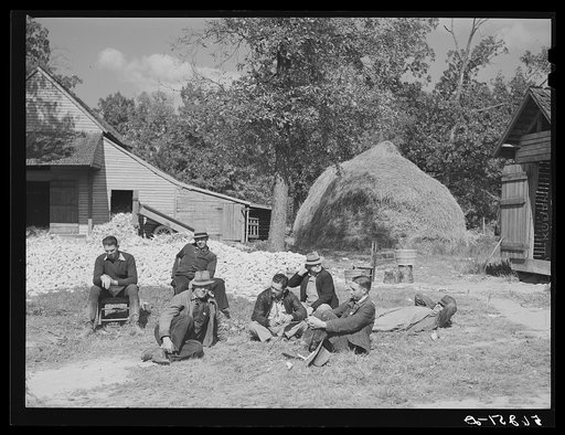 Untitled photo, possibly related to: Resting after dinner following a corn shucking on Hoopers' farm in Corbett Ridge section. Caswell County, North Carolina