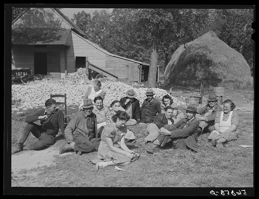 Untitled photo, possibly related to: Resting after dinner following a corn shucking on Hoopers' farm in Corbett Ridge section. Caswell County, North Carolina