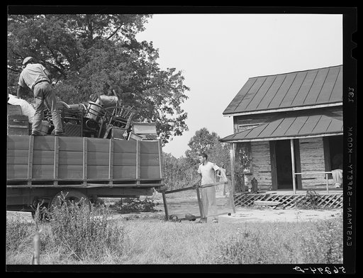In the fall of the year after the crops are up many tenants and share croppers move into another farm. This colored family was moving from this home near Yanceyville to one near Raleigh, North Carolina. Caswell County, North Carolina