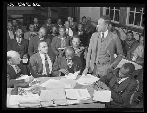 Untitled photo, possibly related to: Negro group meeting of the county land use planning committee in the schoolhouse in Yanceyville, Caswell County, North Carolina. J.E. Brown, leading farmer, elected chairman and also Negro member of Caswell County planning commission