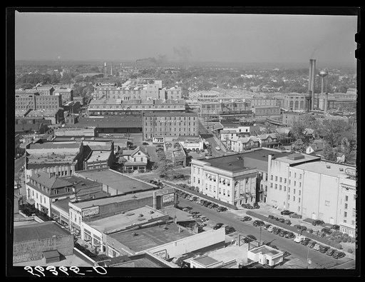 Center of city, with Chesterfield cigarette factory in background. Durham, North Carolina