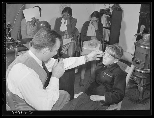 Untitled photo, possibly related to: A FSA (Farm Security Administration) borrower's son being examined in the eye clinic held in the county welfare office in cooperation with the state committee to aid the blind. Yanceyville, Caswell County, North Carolina