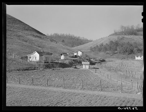 Noah Garland's son's home along the creek. Southern Appalachian Project, near Barbourville, Knox County, Kentucky