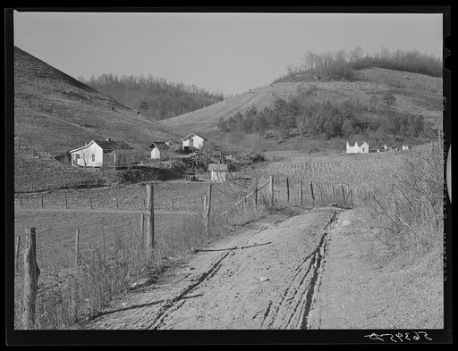 Homes of Noah Garland's son and a neighboring FSA (Farm Security Administration) borrower along the creek. Near Barbourville, Knox County, Kentucky. Southern Appalachian Project