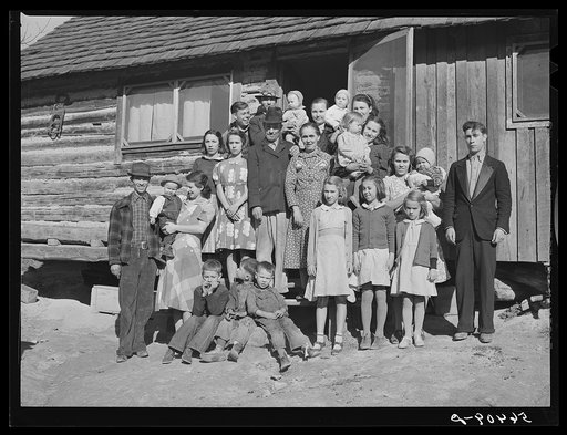 Untitled photo, possibly related to: Noah Garland with his sons and some of their families. Southern Appalachian Project near Barbourville, Knox County, Kentucky